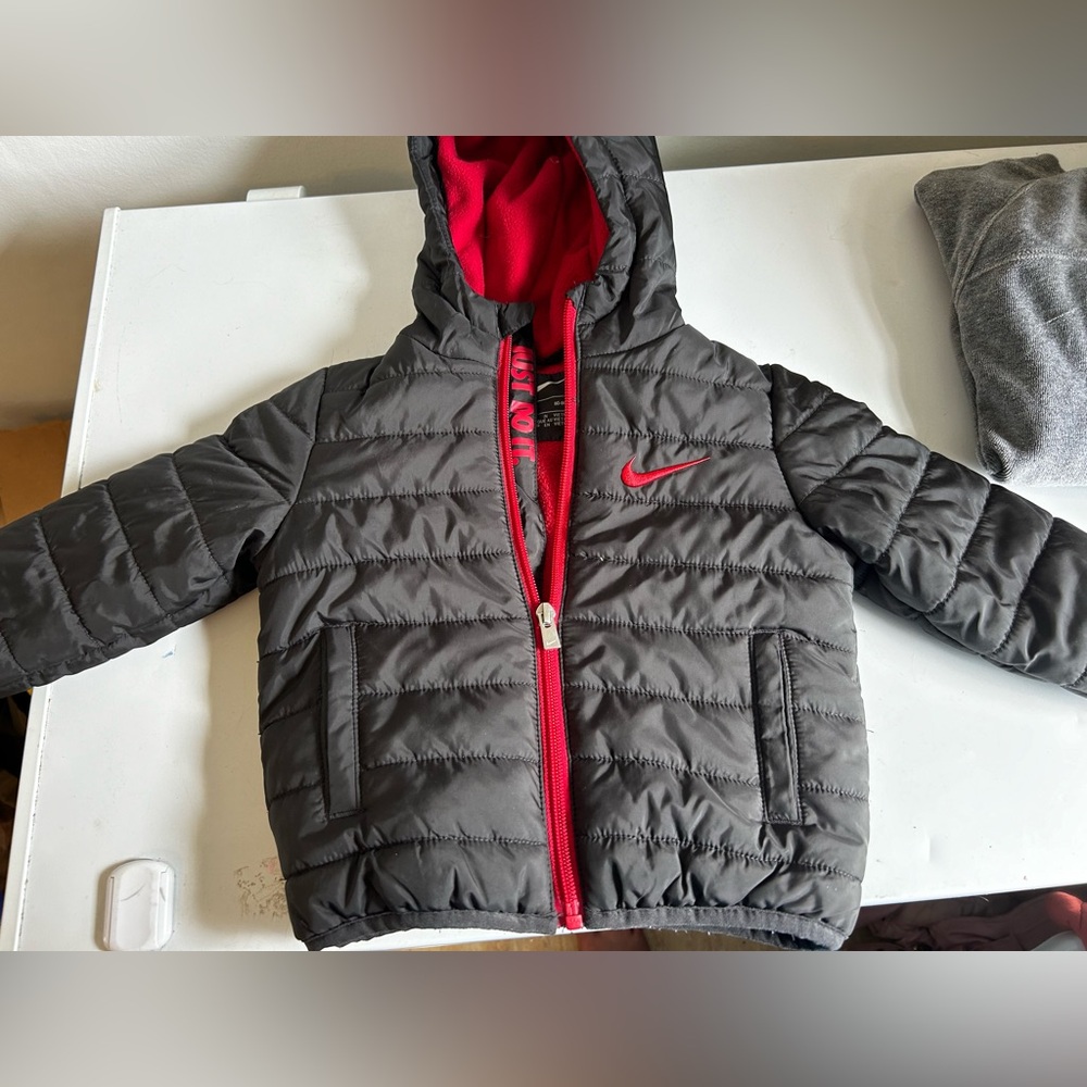 Black and Red Nike winter coat 18m